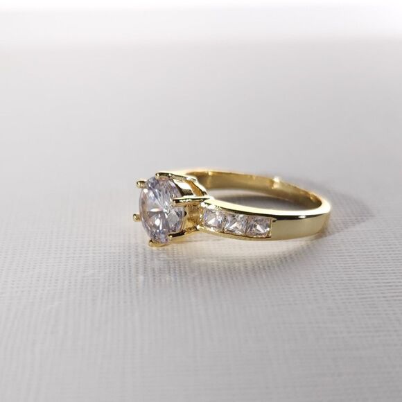 Simulated White Diamond Ring in a Goldtone Ring Size 8 - Picture 5 of 9